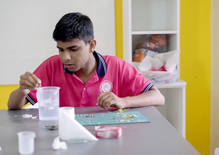 Student conducting an experiment